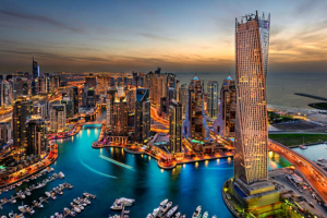 Dubai Marina from a high view showing the boats, sea, and the city scape.